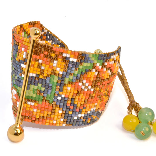 FINE ART BRACELET IN BRONZE, YELLOW, ORANGE, BLUE, METALLIC BLUE, LIGHT GREEN AND WHITE