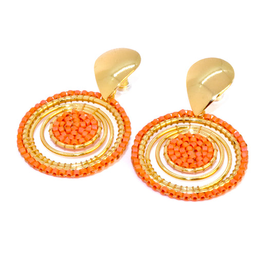 TWIST EARRINGS IN ORANGE