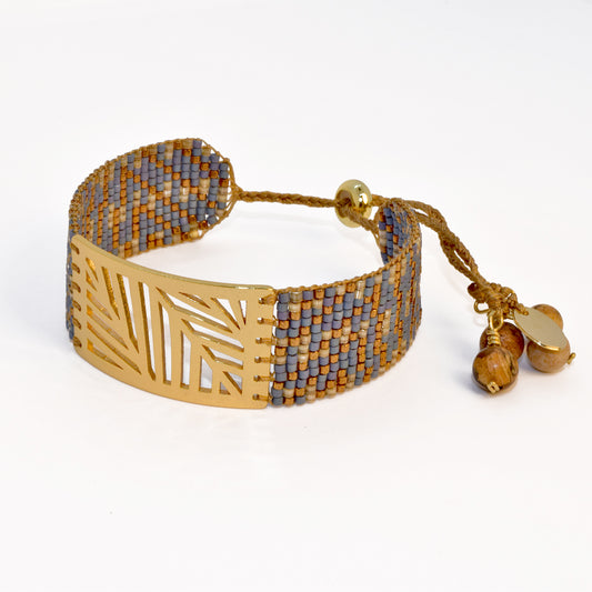 PALM BRACELET IN BRONZE, BONE AND SKY BLUE