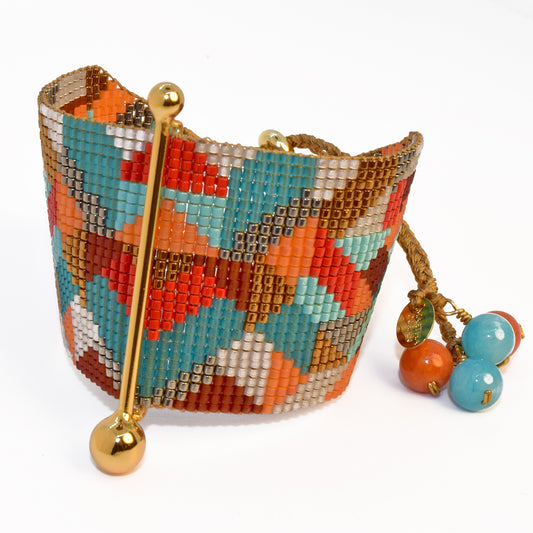 FINE ART BRACELET IN BRONZE, GUNMETAL, TURQUOISE, AQUA, RED, BURGUNDY, ORANGE AND PEARL