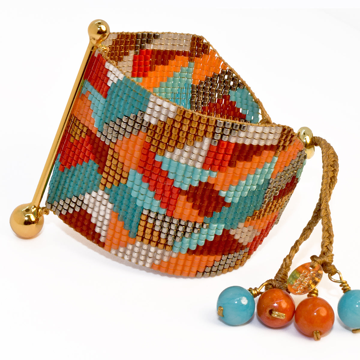 FINE ART BRACELET IN BRONZE, GUNMETAL, TURQUOISE, AQUA, RED, BURGUNDY, ORANGE AND PEARL