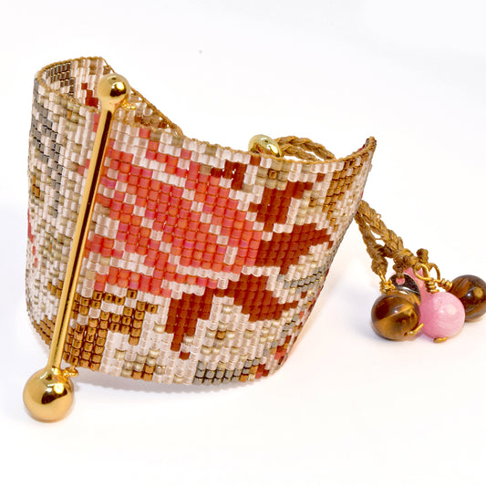 FINE ART BRACELET IN GOLD, TERRACOTTA, CORAL, PEARL WHITE AND GUNMETAL