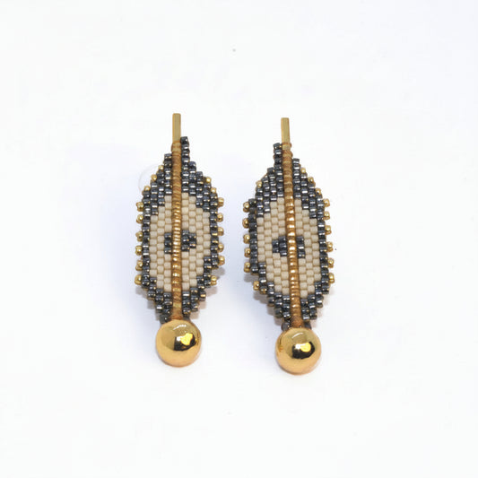 Pair of beaded earrings on a white background
