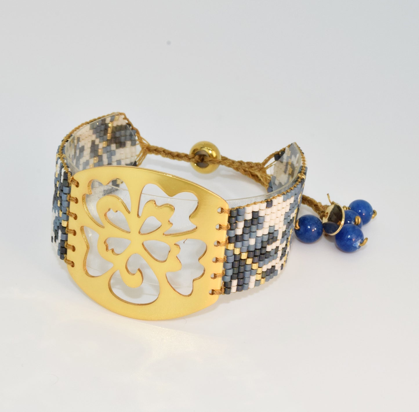 ORCHID BRACELET IN GOLD WITH BLUE AND WHITE COLORS