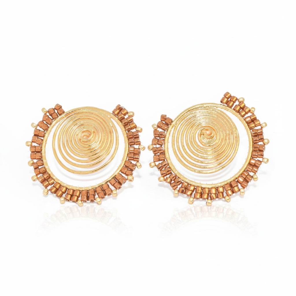 Pair of gold and brown circular earrings on a white background